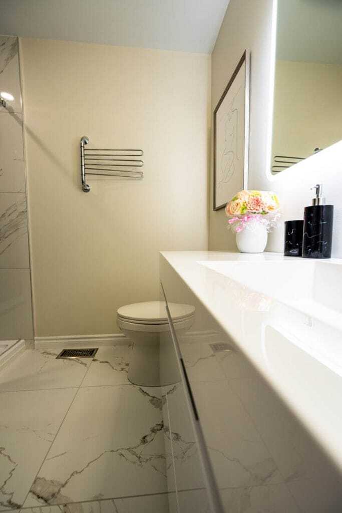 3 piece bathroom renovation with vanity and tiles