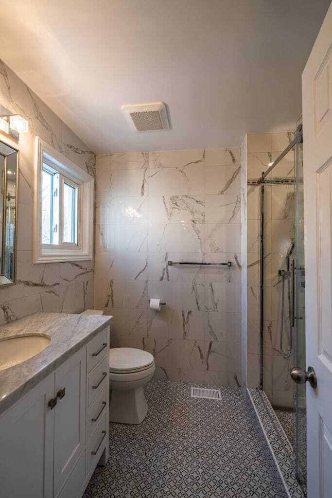 fully renovated tiled bathroom