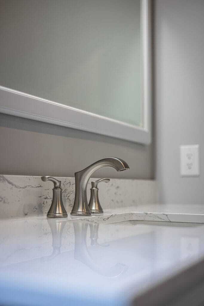 brushed nichel faucet close up
