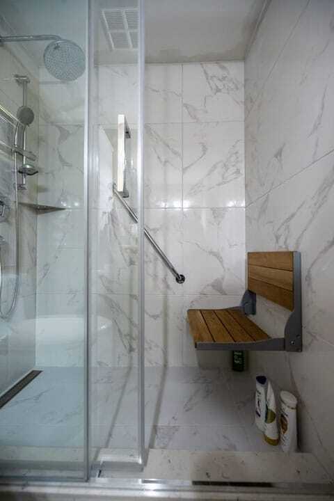Moen shower folding bench condo